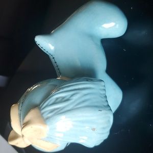 A vintage blue poppy with yellow bow!